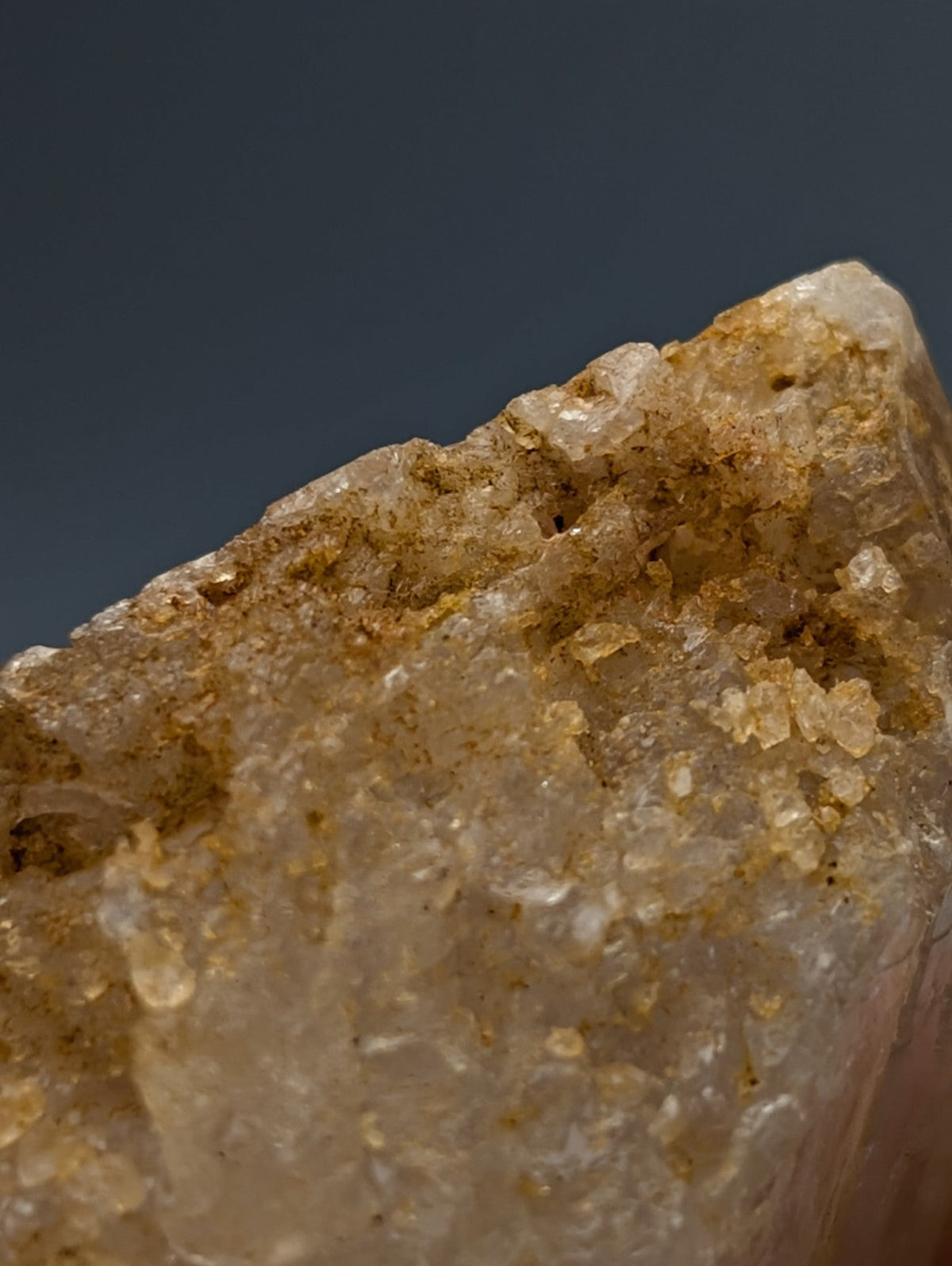 Unique dissolution quartz crystal point with pale golden translucent hues and internal formations from Garland County Arkansas