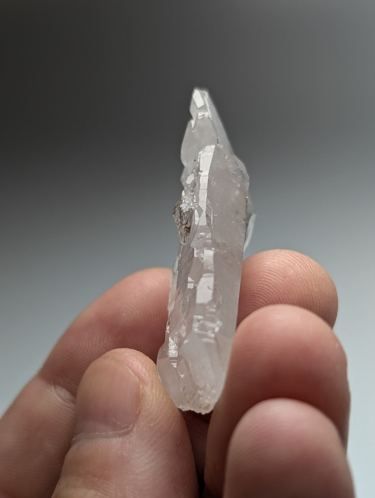 A translucent clear quartz unique double terminated floater crystal with pointed tip from garland county arkansas usa