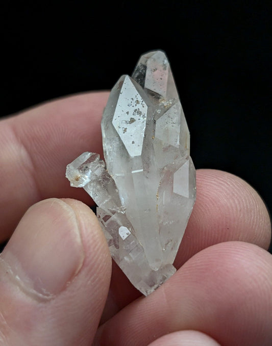 Unique double terminated floater quartz crystal cluster with clear translucent geometric facets from montgomery county arkansas