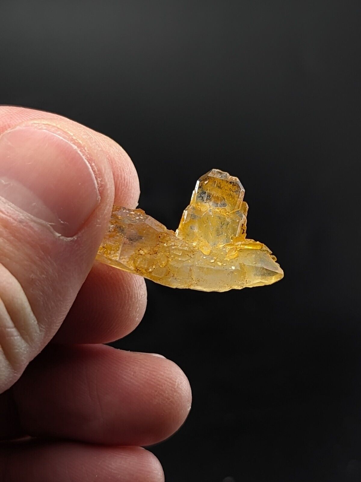 Translucent yellow crystal formation.