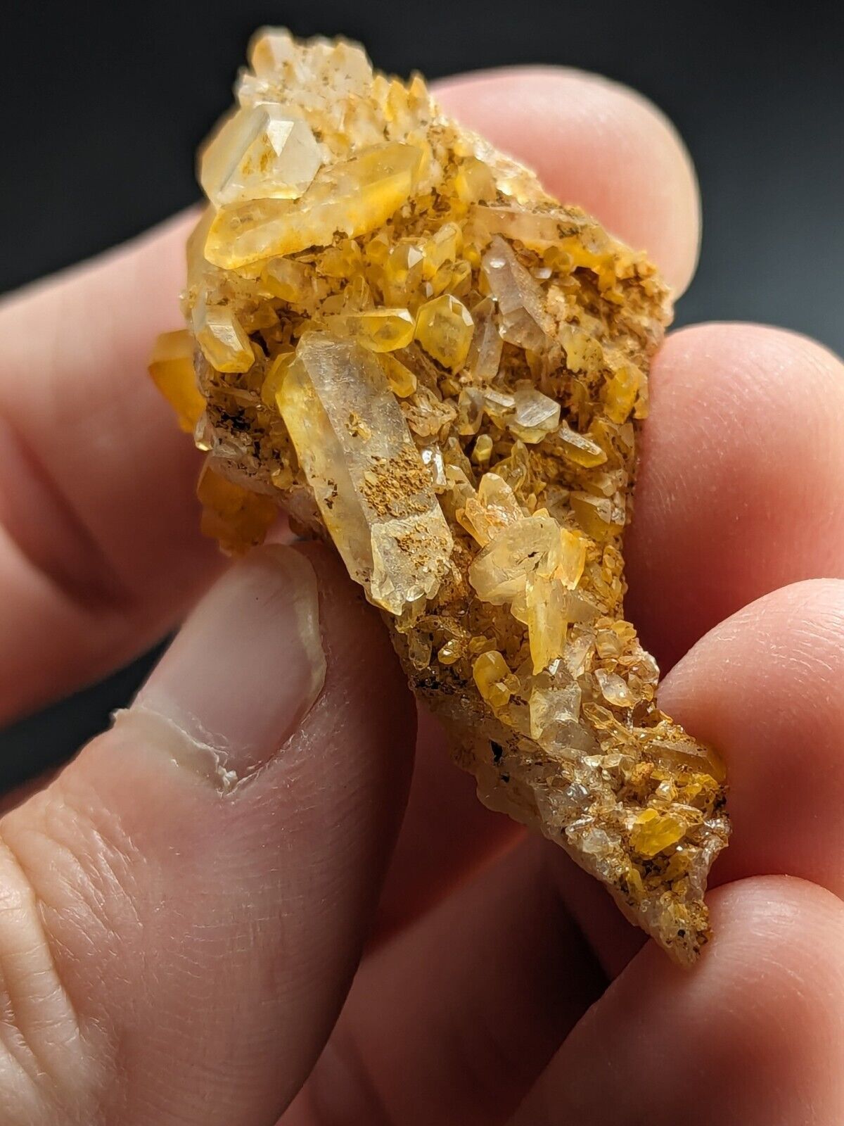 Cluster of yellow quartz crystals.