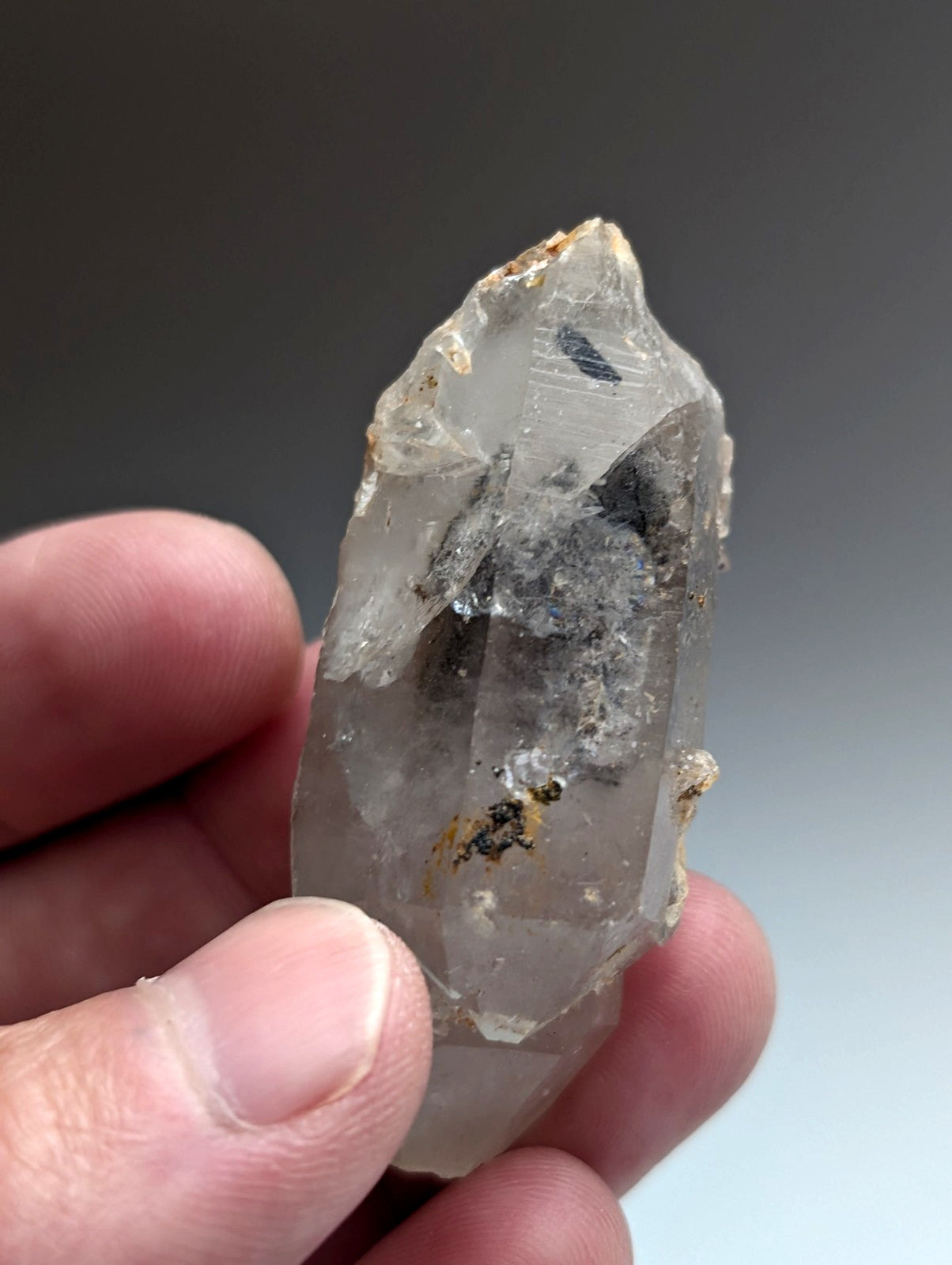 Unique translucent quartz crystal with nacrite inclusions and rough jagged surface from Montgomery County Arkansas USA