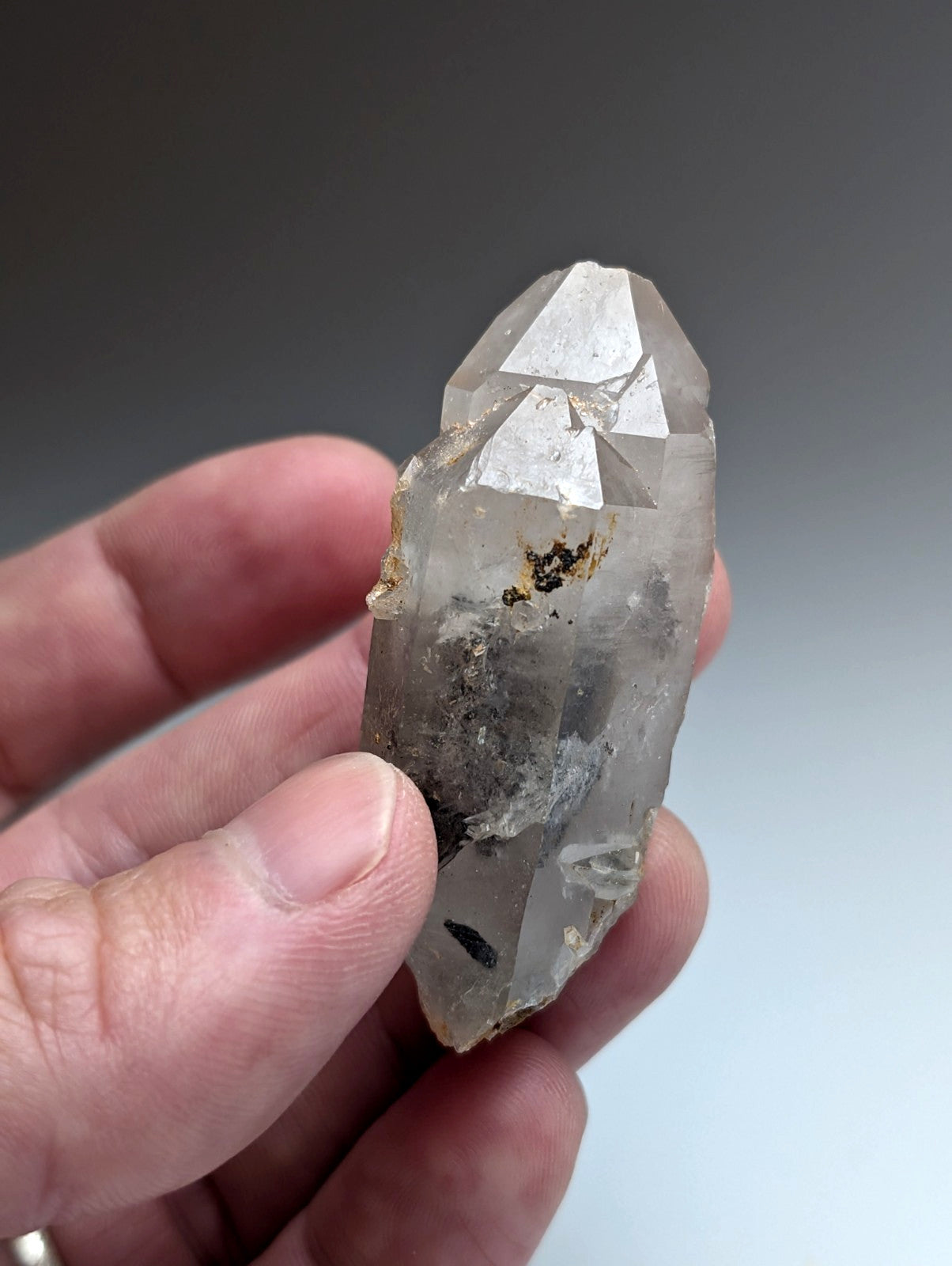 Unique quartz crystal with nacrite inclusions translucent clear pointed tip from montgomery county arkansas usa