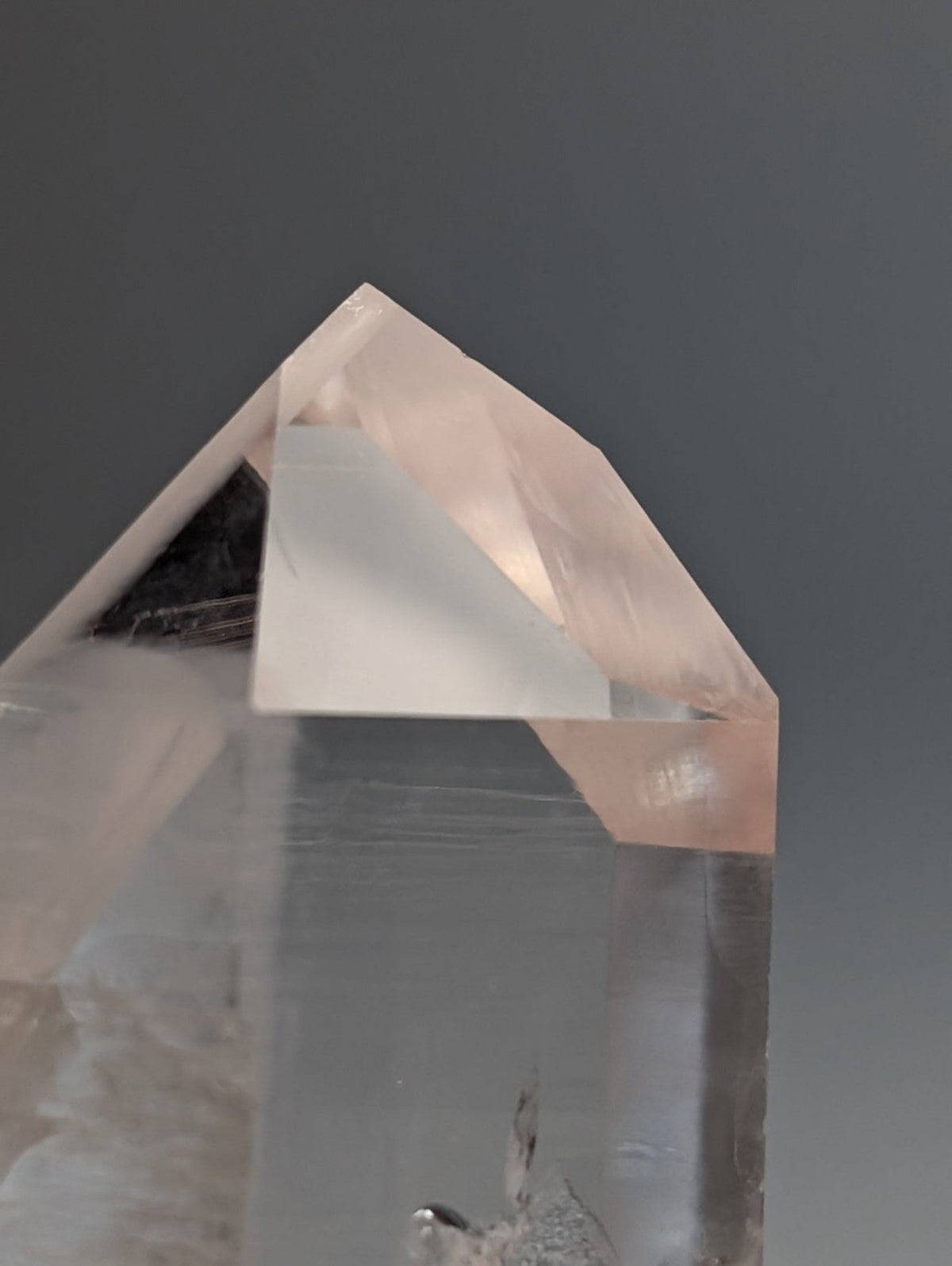 Unique quartz crystal point with pale pink translucent color and geometric facets from Arkansas usa old stock A plus grade