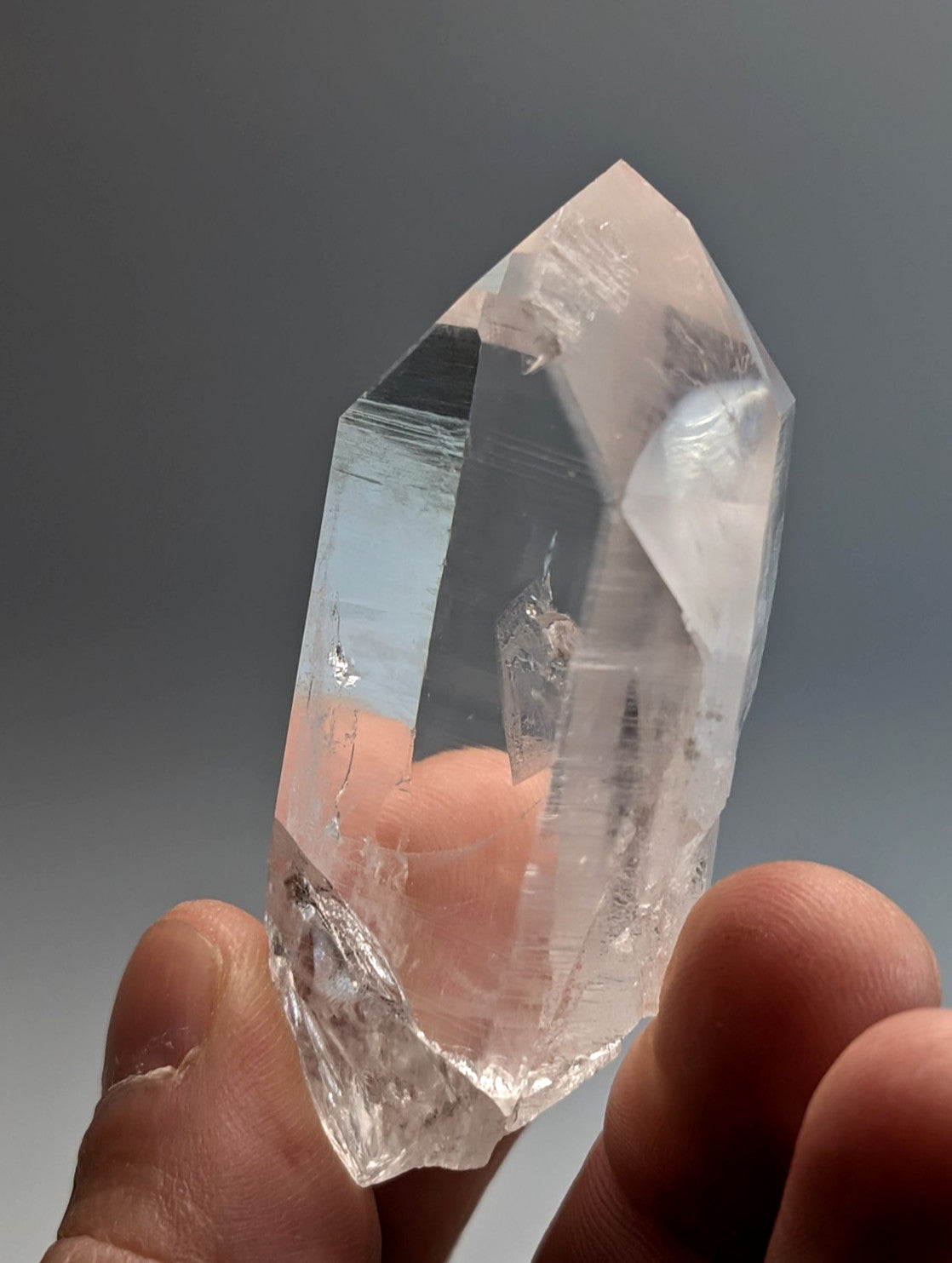 Unique quartz crystal point old stock from arkansas usa with a clear transparent quartz crystal and natural facets