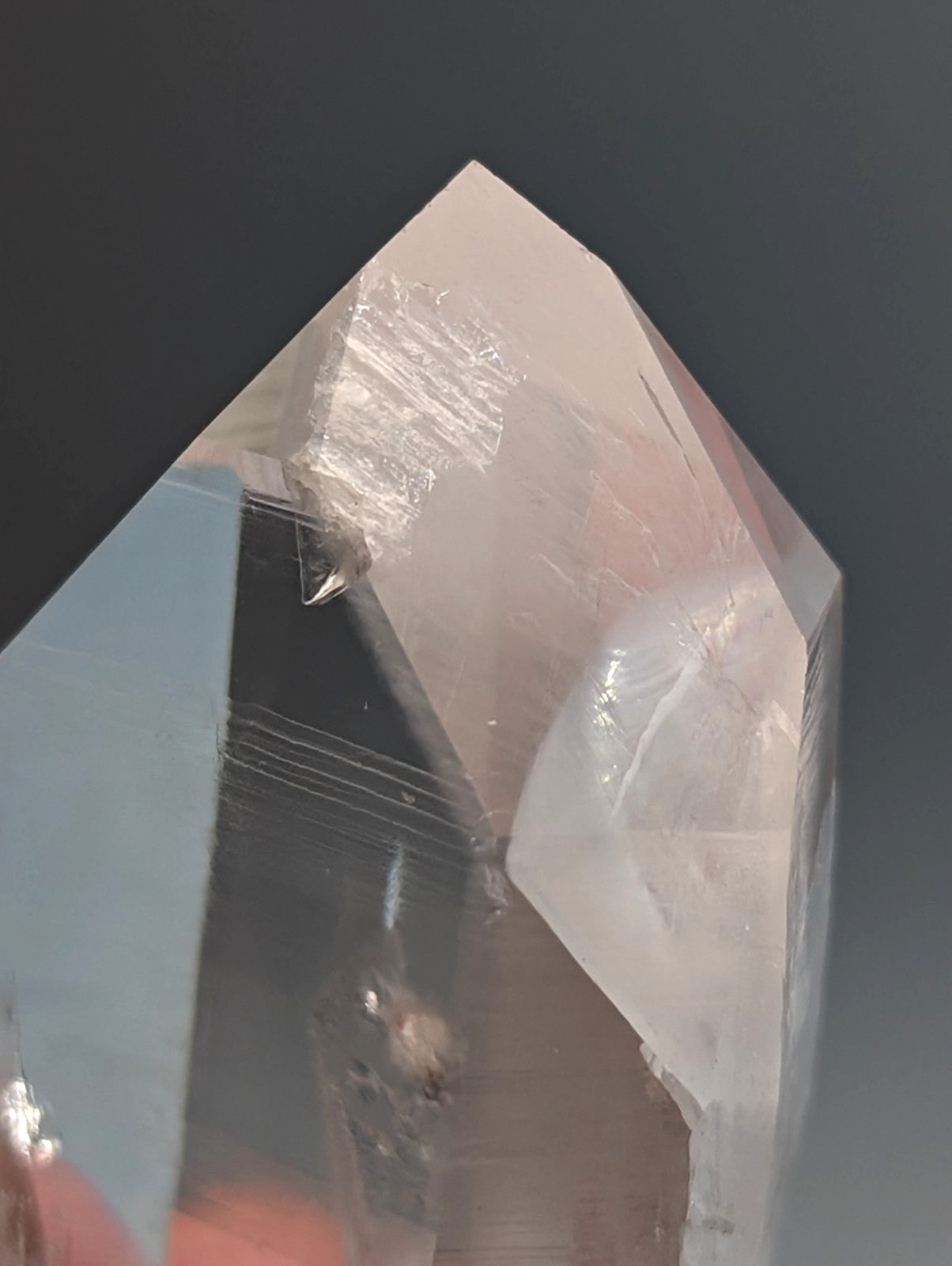 Unique quartz crystal point from arkansas usa with clear transparent material and natural internal striations