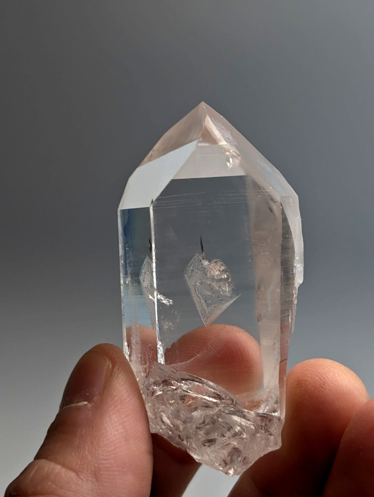 Unique quartz crystal point old stock from arkansas usa with clear transparent faceted sides and pointed top