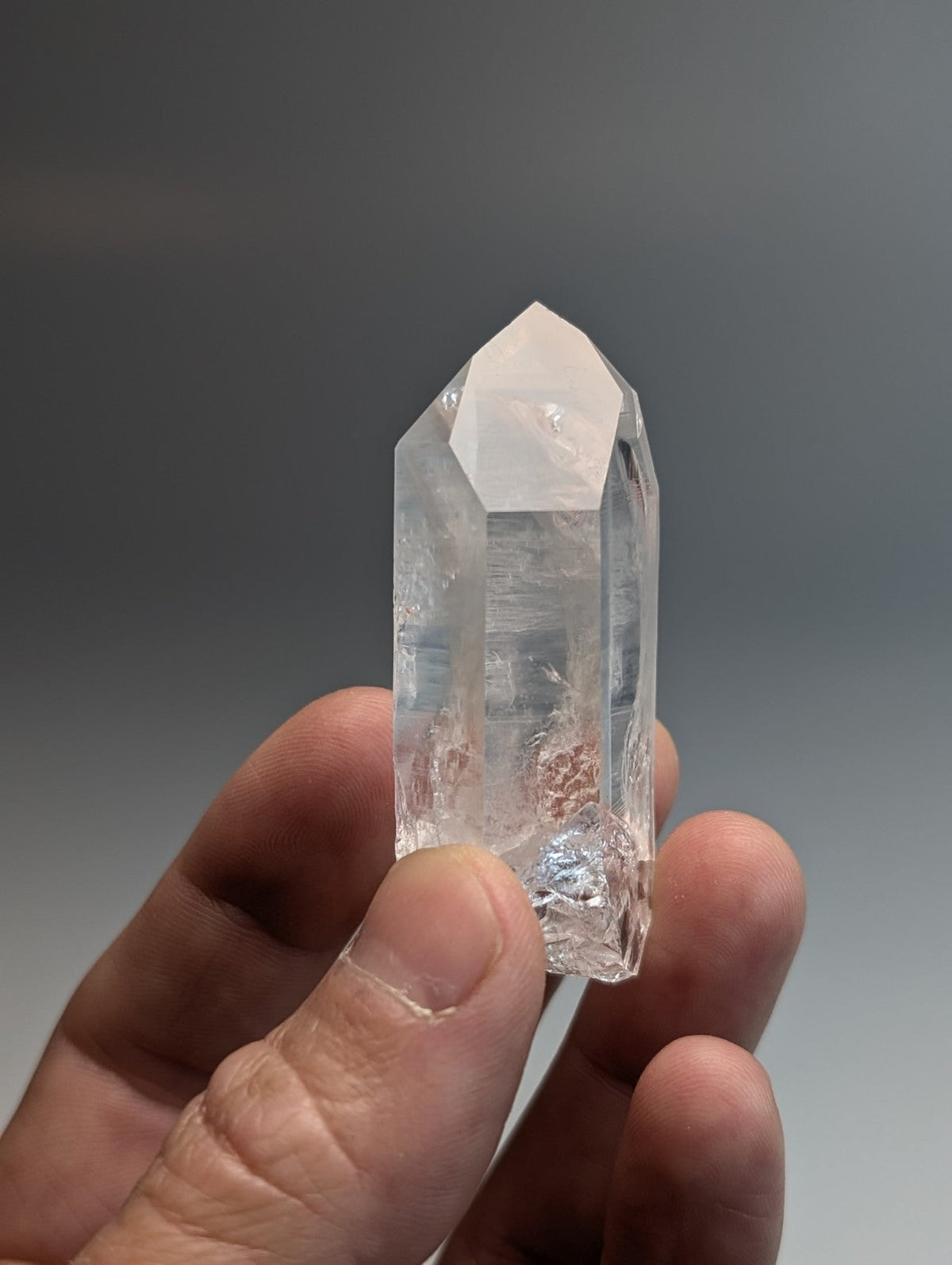 Unique quartz crystal point from arkansas usa with clear transparent color natural internal inclusions and pointed top