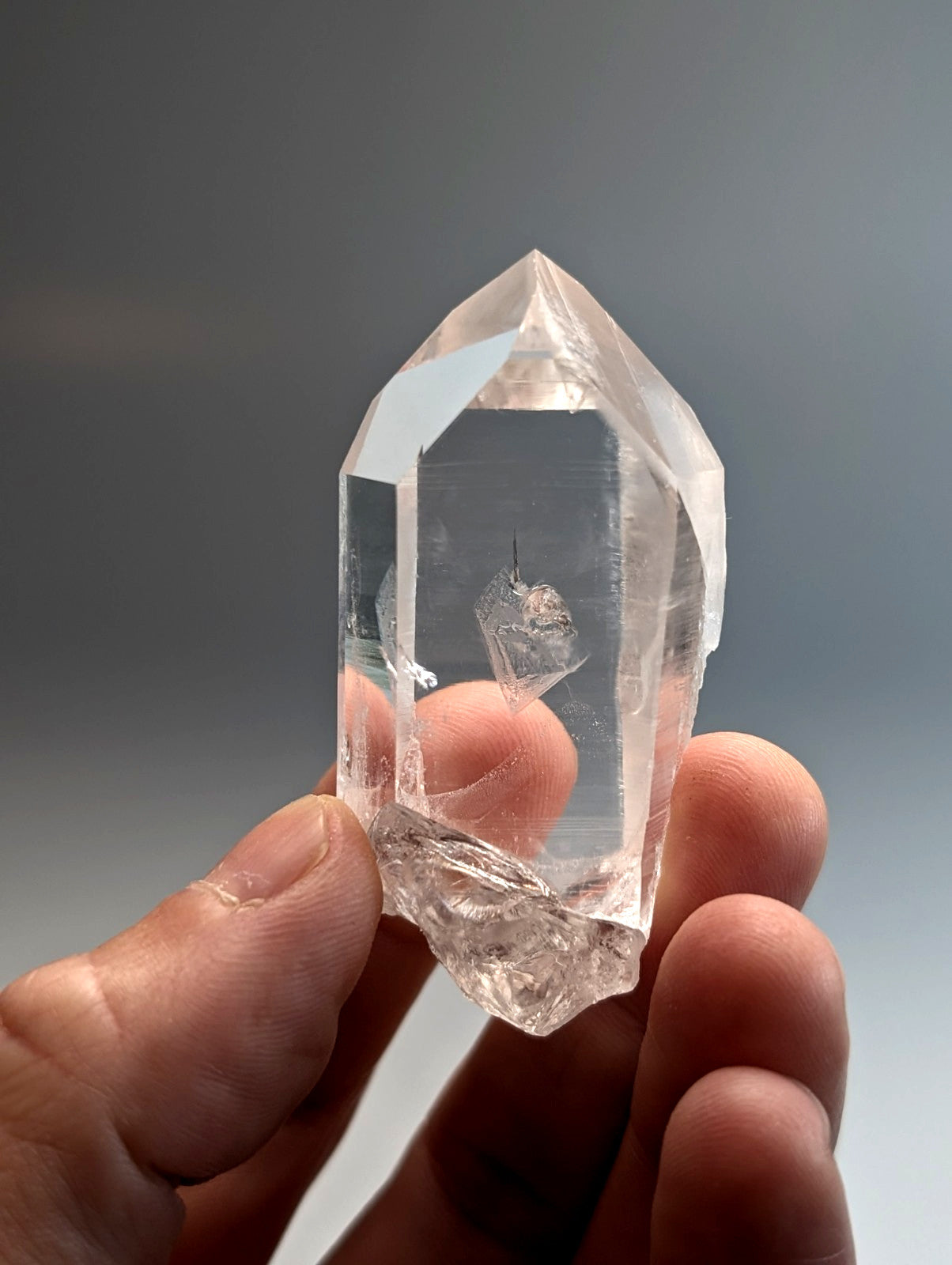 A clear transparent quartz crystal point with natural facets from old stock arkansas usa a plus water clear quality