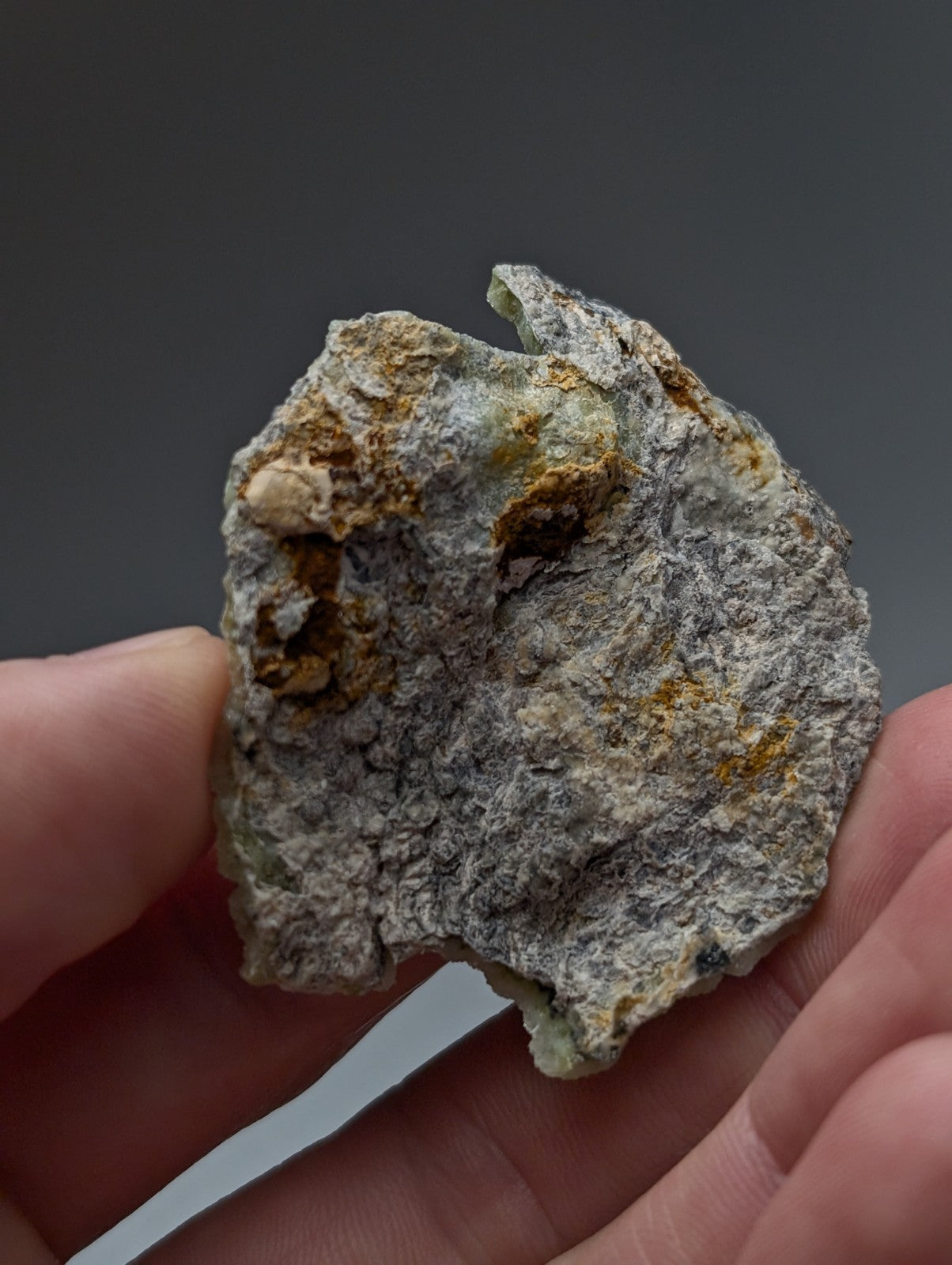 Unique wavellite cluster with rough mottled gray surface and patches of yellow and brown from Mauldin Mountain Arkansas