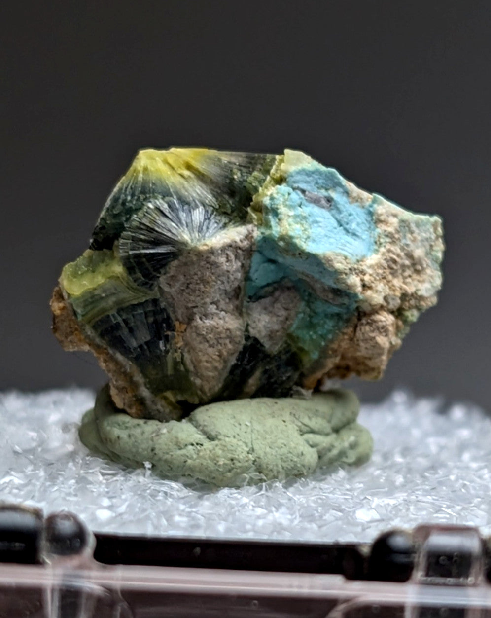 Unique wavellite mineral specimen with vibrant turquoise and yellow fan-like crystals on earthy matrix from Arkansas
