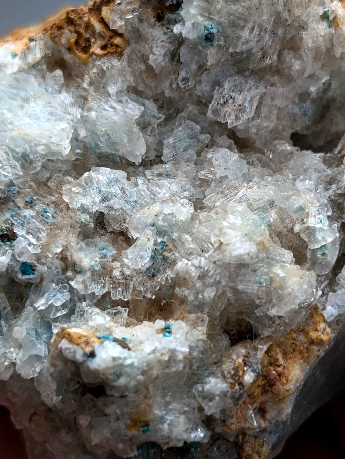 Very rare aurichalcite and selenite mineral specimen with translucent blue and clear hues and earthy brown matrix from Arkansas