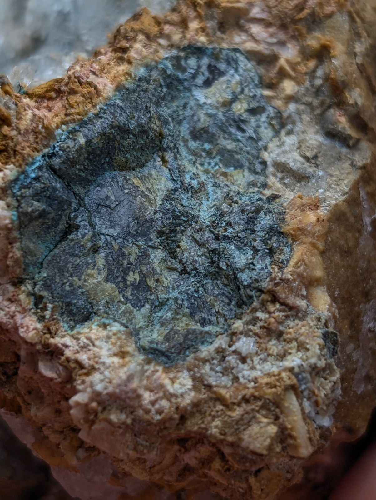 A very rare aurichalcite and selenite mineral specimen with a mottled blue-green surface from red cloud mine arkansas