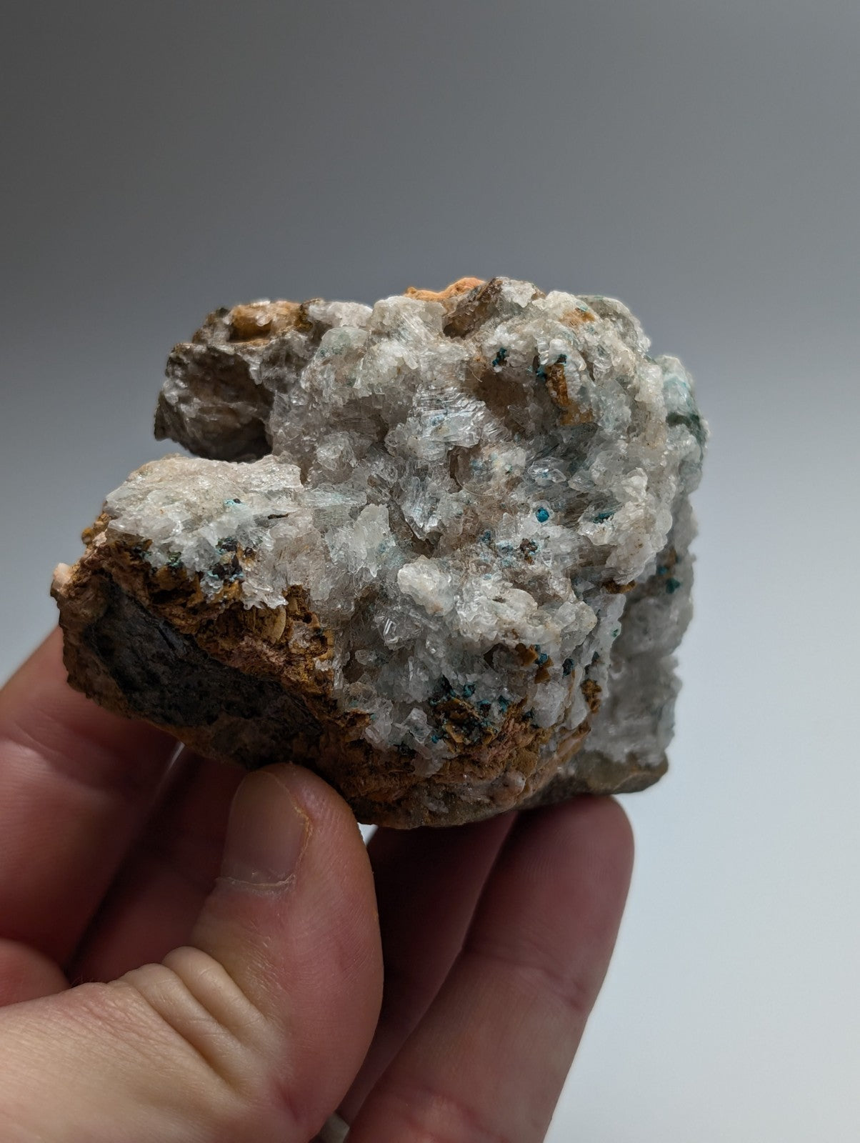 A very rare aurichalcite and selenite mineral specimen with white crystals and brownish orange matrix from red cloud mine arkansas
