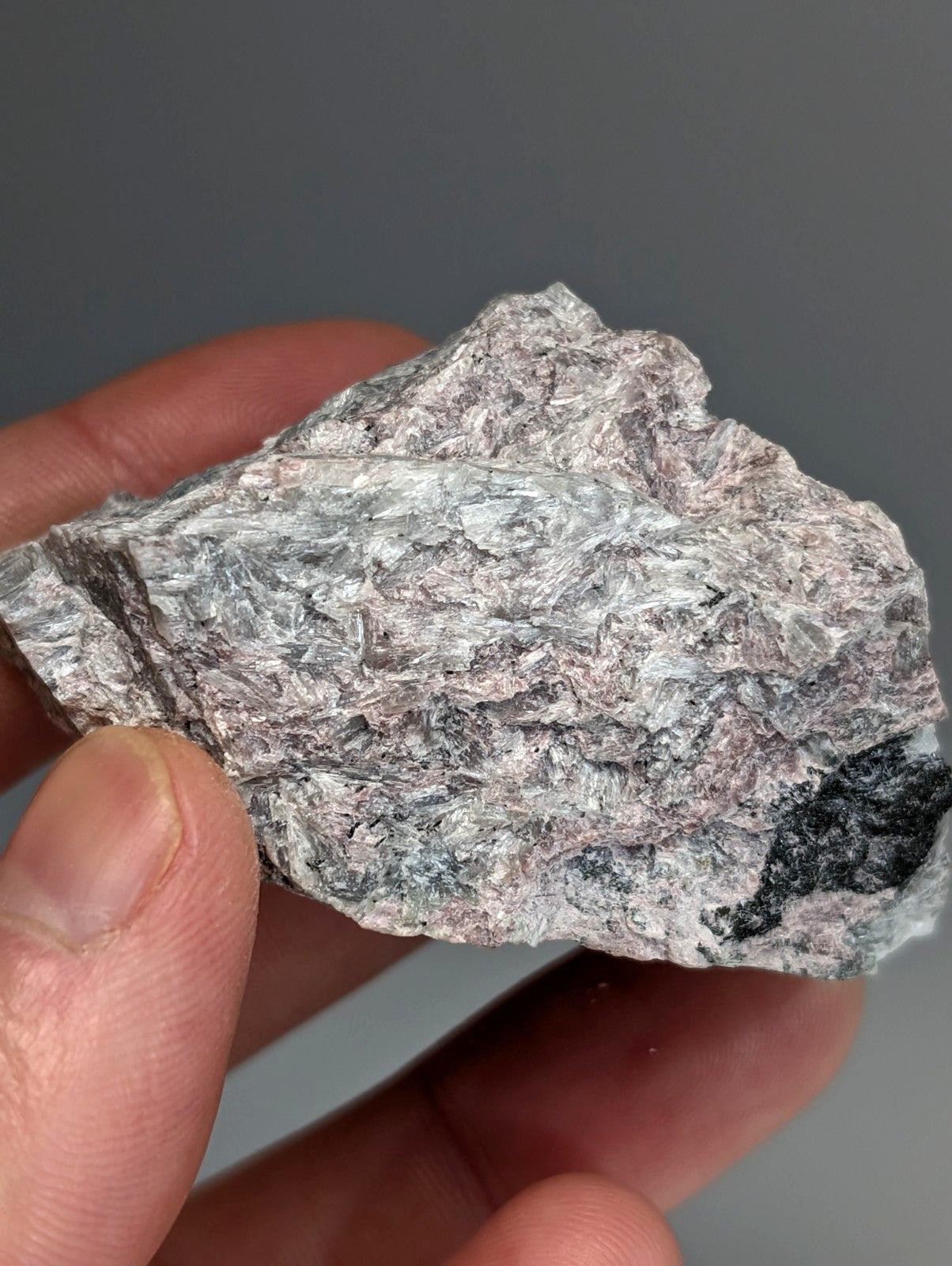 Very rare miserite and wollastonite rock from wilson springs arkansas with mottled gray pink hues and black veining