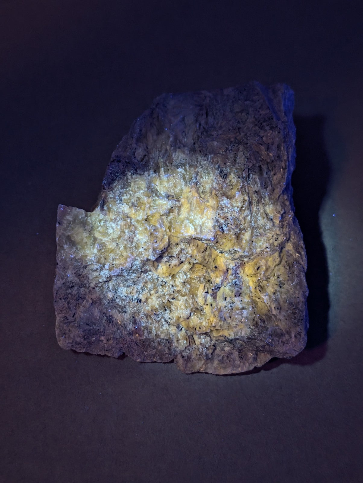 Very rare miserite and wollastonite mineral specimen with textured surface and yellow and grayish-purple patches from arkansas