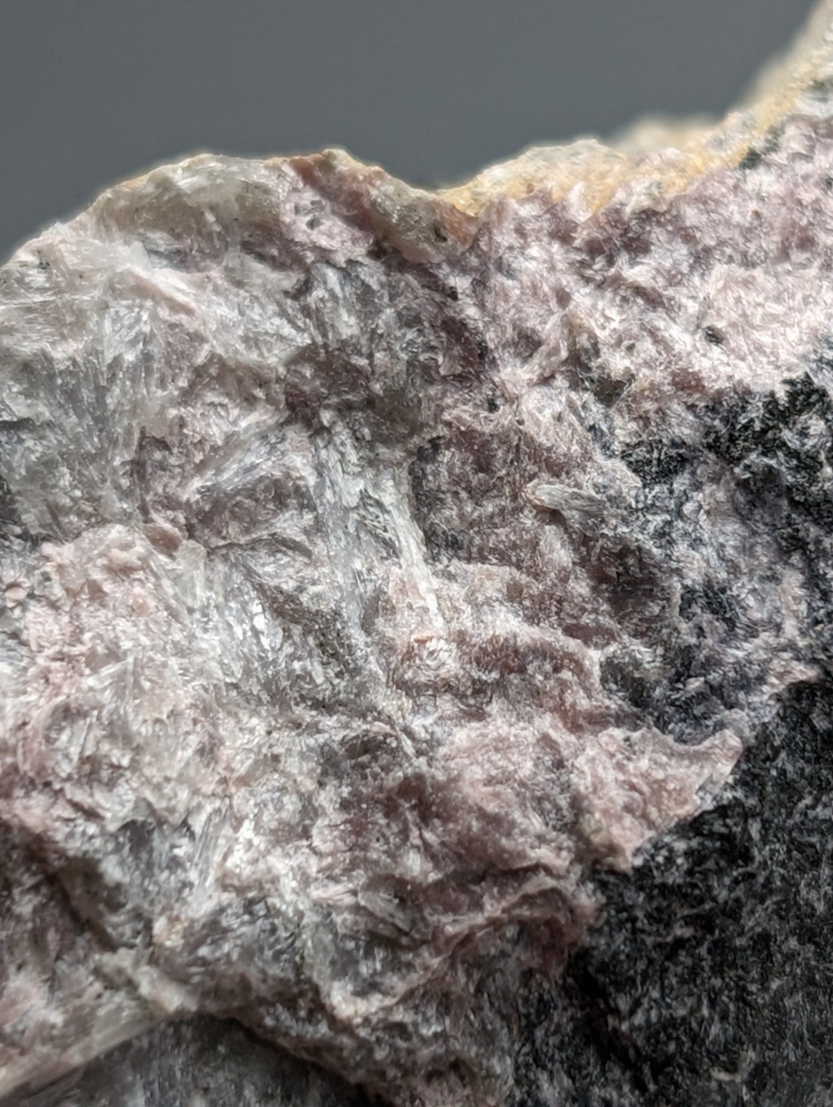 Very rare miserite and wollastonite mineral specimen with mottled pale pink and grayish-white surface from arkansas