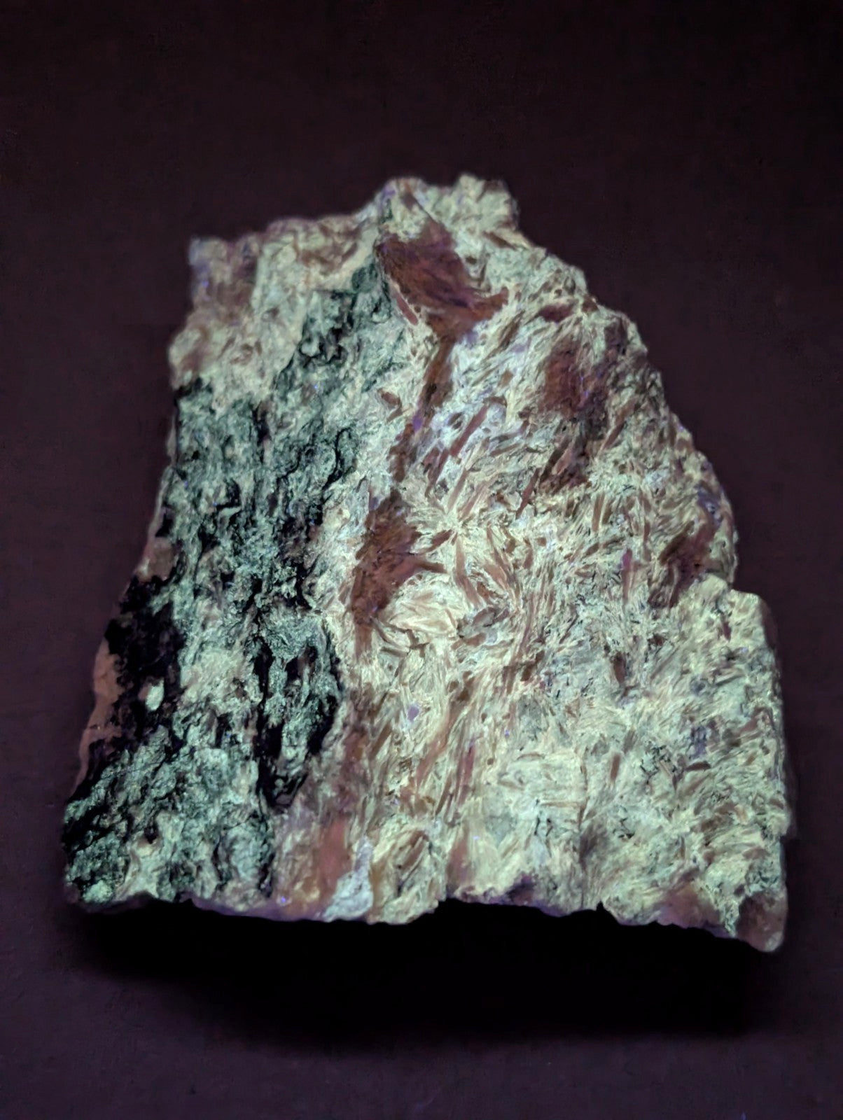 A very rare miserite and wollastonite mineral specimen from wilson springs with greenish-gray and reddish-brown hues