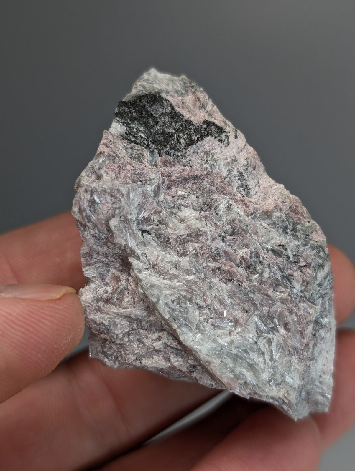 Very rare miserite and wollastonite rock with gray white and subtle pink mottled surface from wilson springs arkansas usa