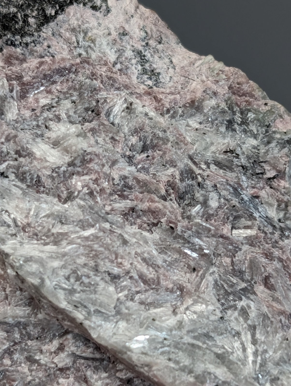 Very rare miserite and wollastonite mineral specimen with gray and pink hues and translucent crystals from arkansas usa