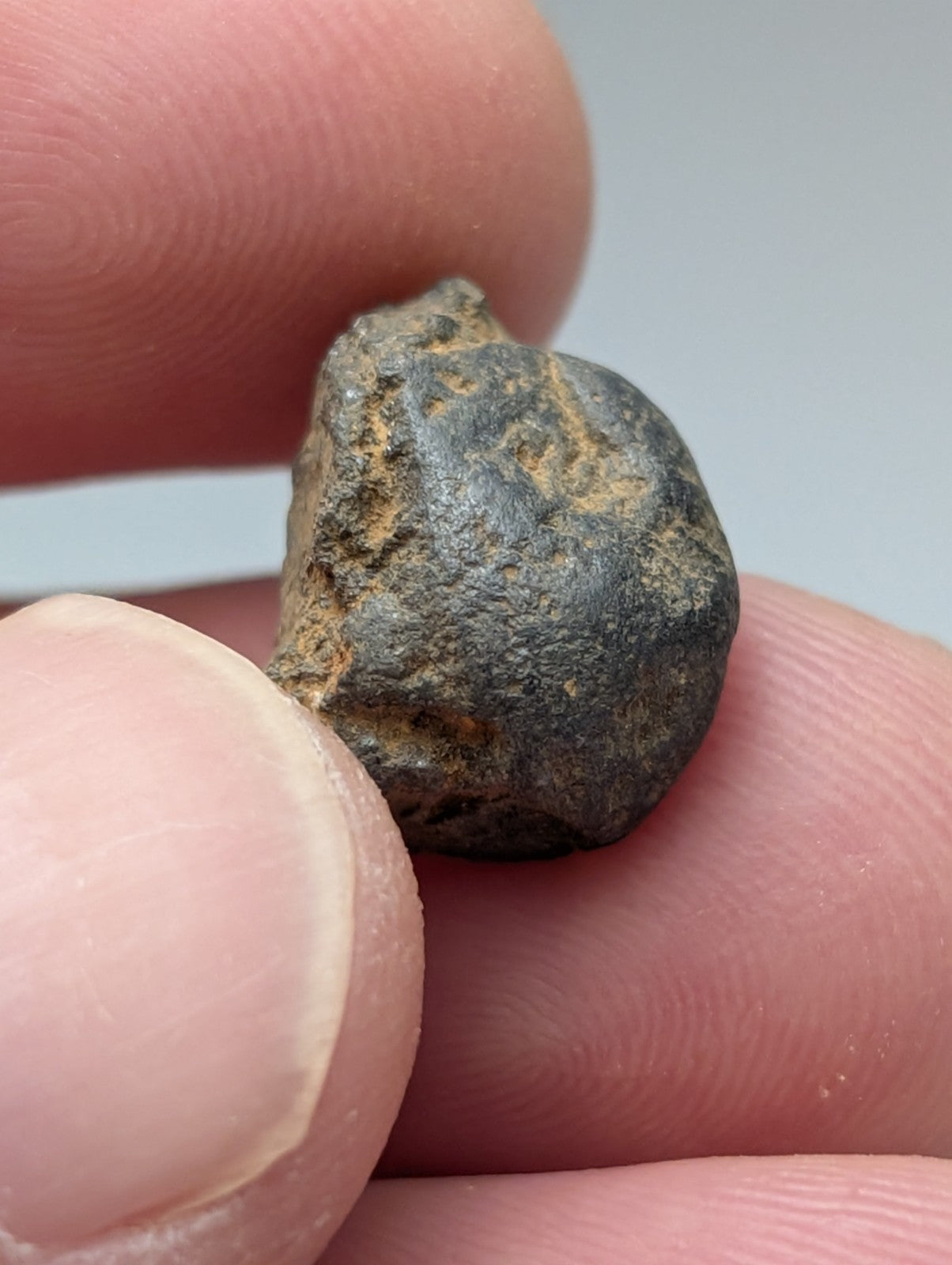 Very rare placer rutile meteorite from magnet cove arkansas with dark rough surface and golden brown streaks set of 25