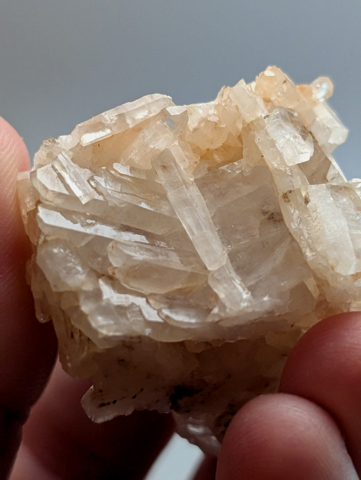 A translucent pale yellowish-white faden wheel quartz crystal with interlocking formations from montgomery county arkansas