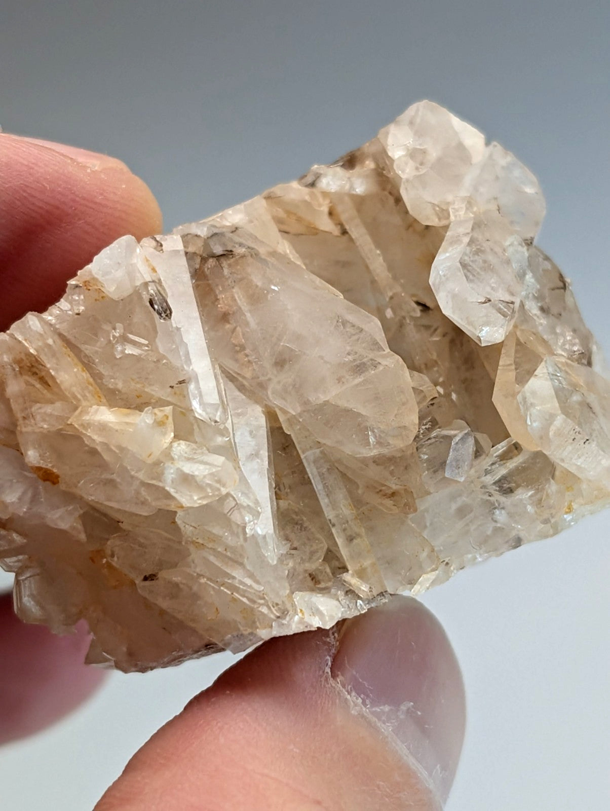 A very unique faden wheel quartz crystal cluster with pale translucent facets and golden inclusions from arkansas usa