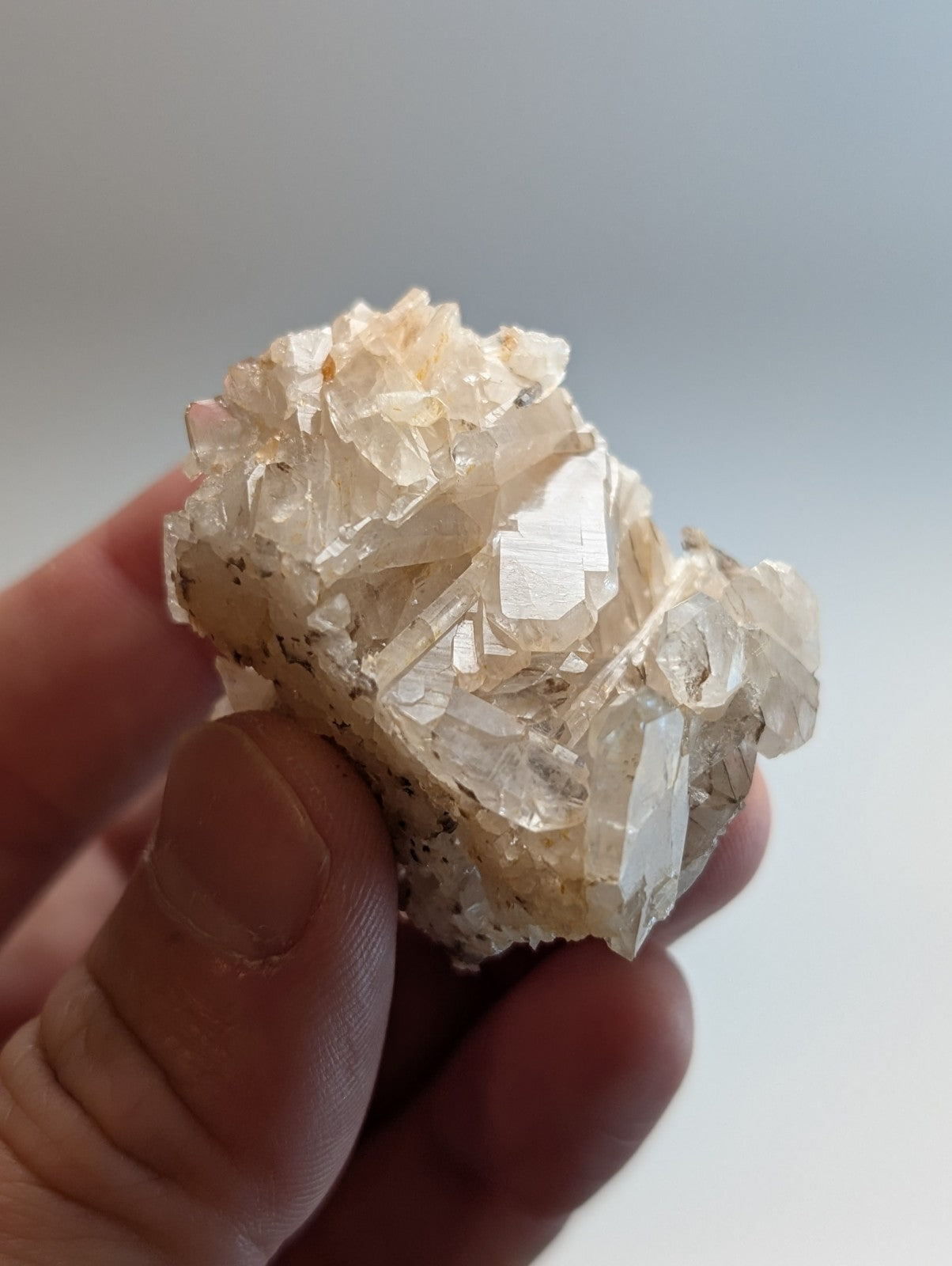 A translucent pale yellow faden wheel quartz crystal with sharp faceted edges from Montgomery County Arkansas usa