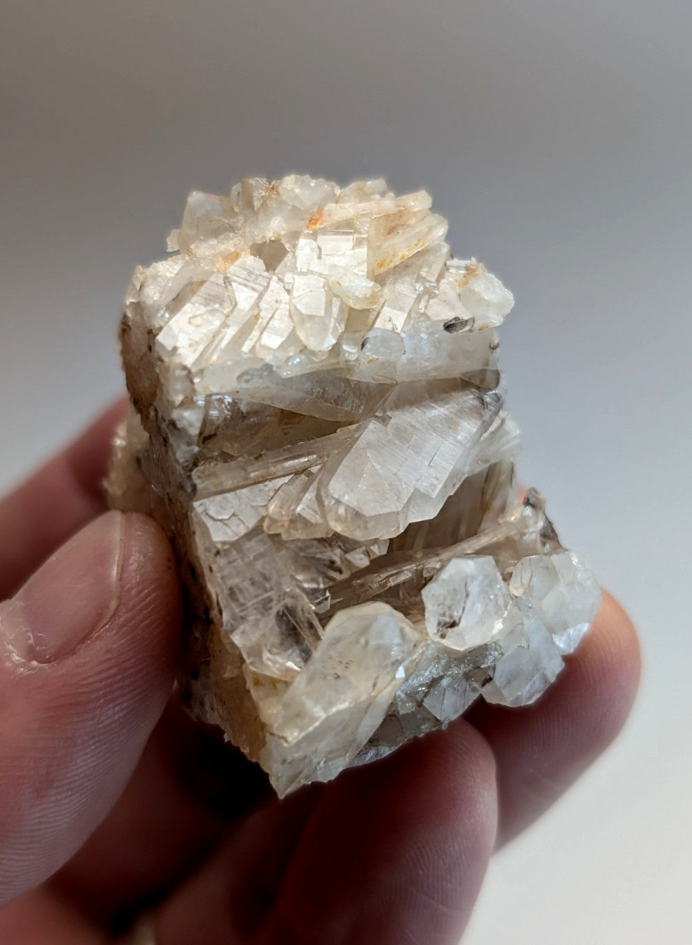 A translucent pale yellow faden wheel quartz crystal with sharp facets from Montgomery County Arkansas USA