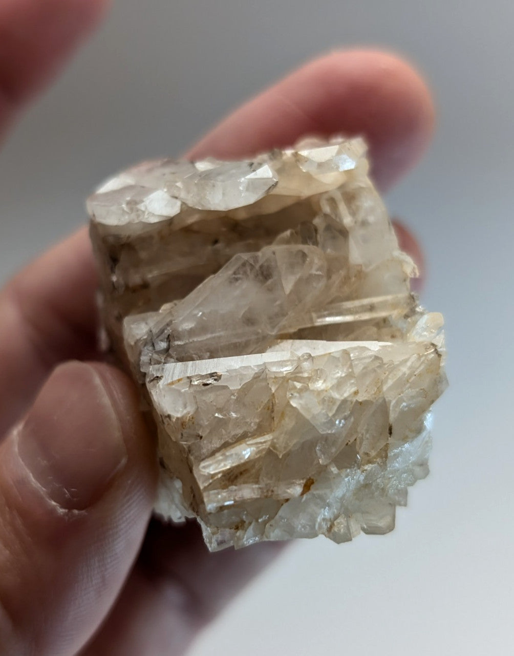 A translucent pale yellowish-white quartz crystal cluster with jagged edges from Montgomery County Arkansas USA