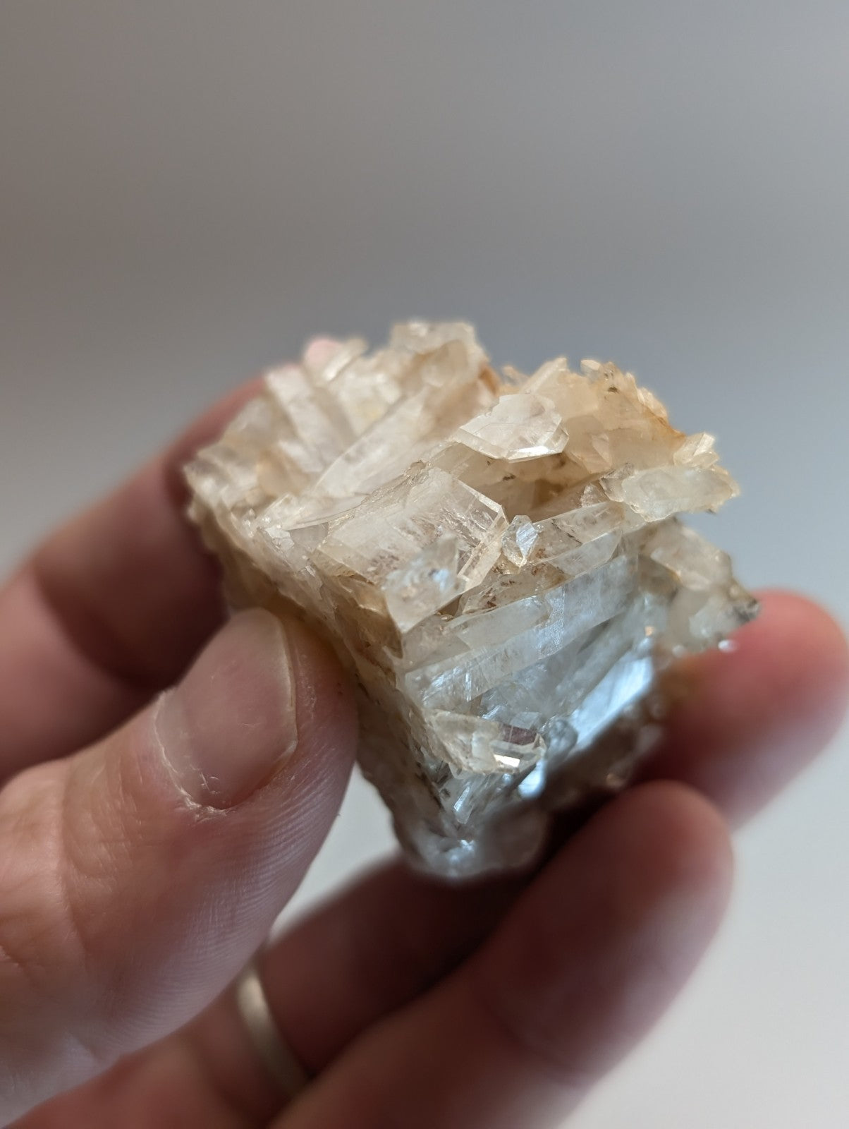 A translucent pale yellowish faden wheel quartz crystal with sharp facets from Montgomery County Arkansas usa