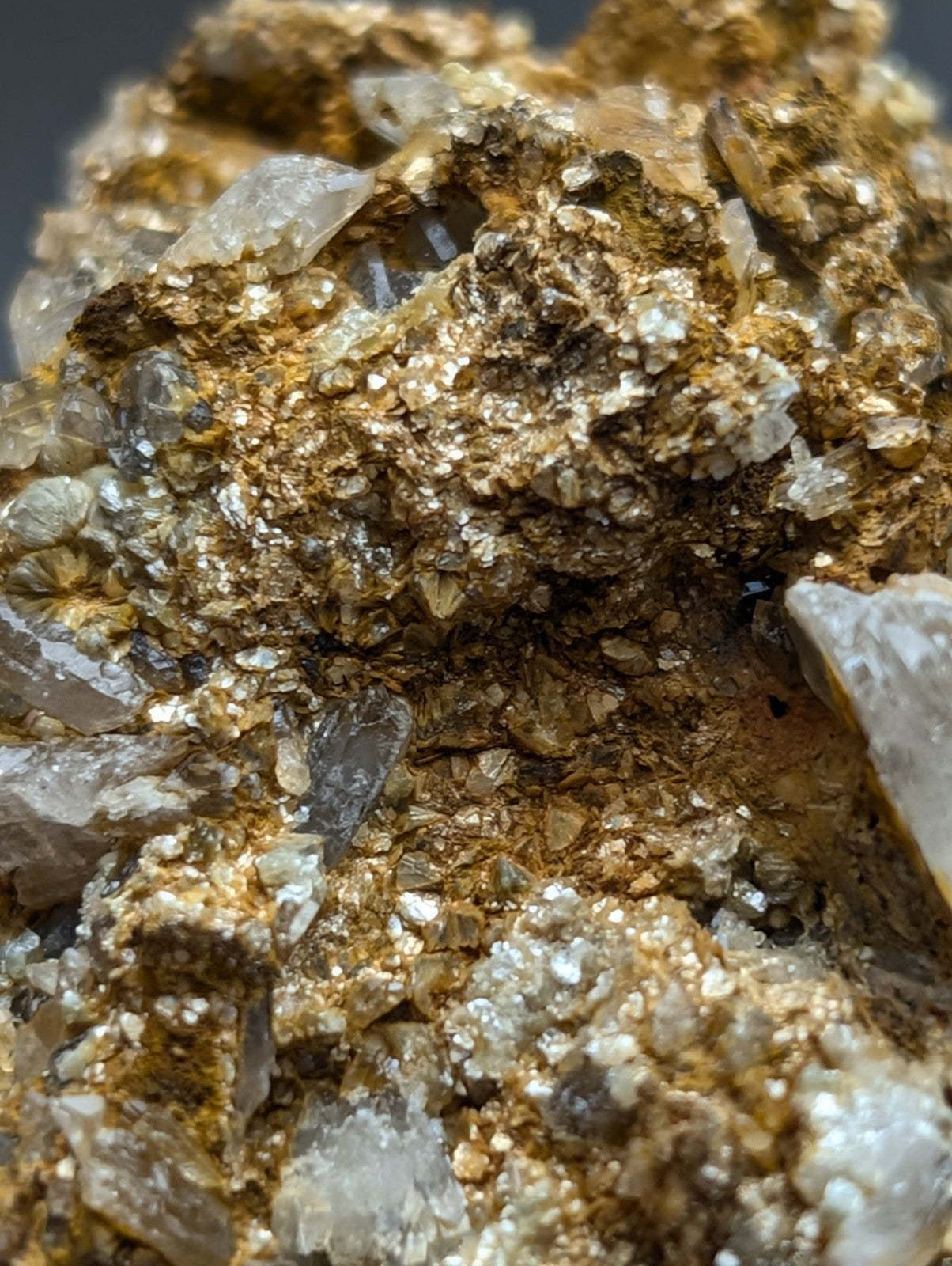 Very unique quartz and cookeite conglomerate with translucent quartz crystals in golden brown metallic matrix from Arkansas