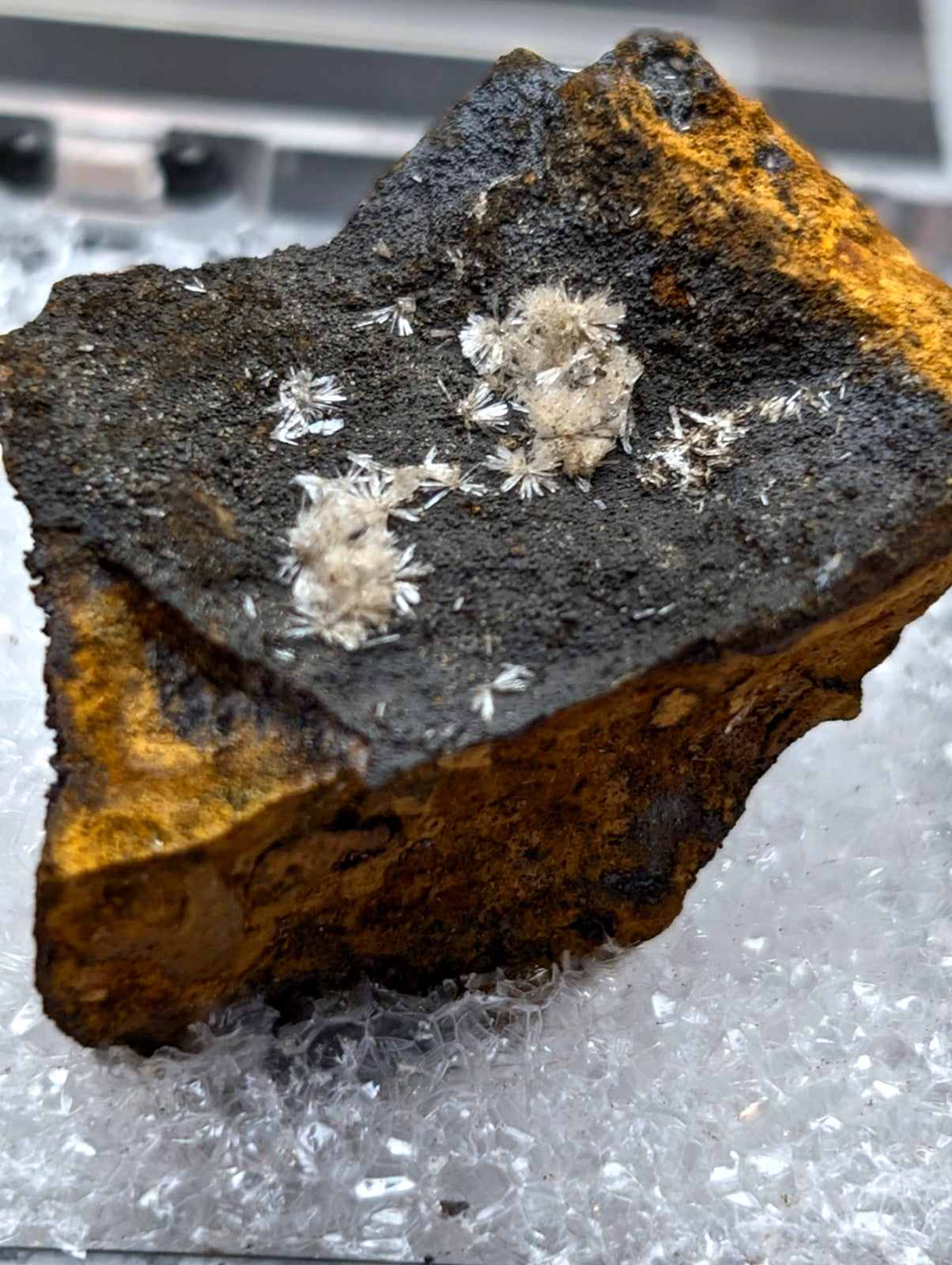 A rugged wavellite mineral from potash sulphur springs arkansas with orange rust and white crystalline formations