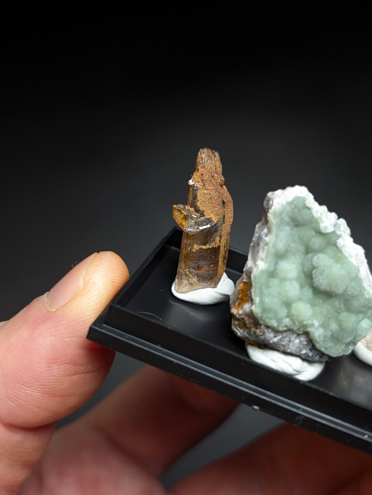 A rustic, brownish-orange mineral specimen with a rough, textured surface and visible crystalline formations.
