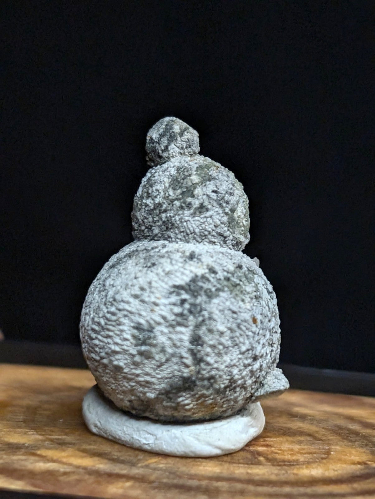 Gray, textured stone gourd figurine with a rough, natural surface and three rounded segments stacked vertically.