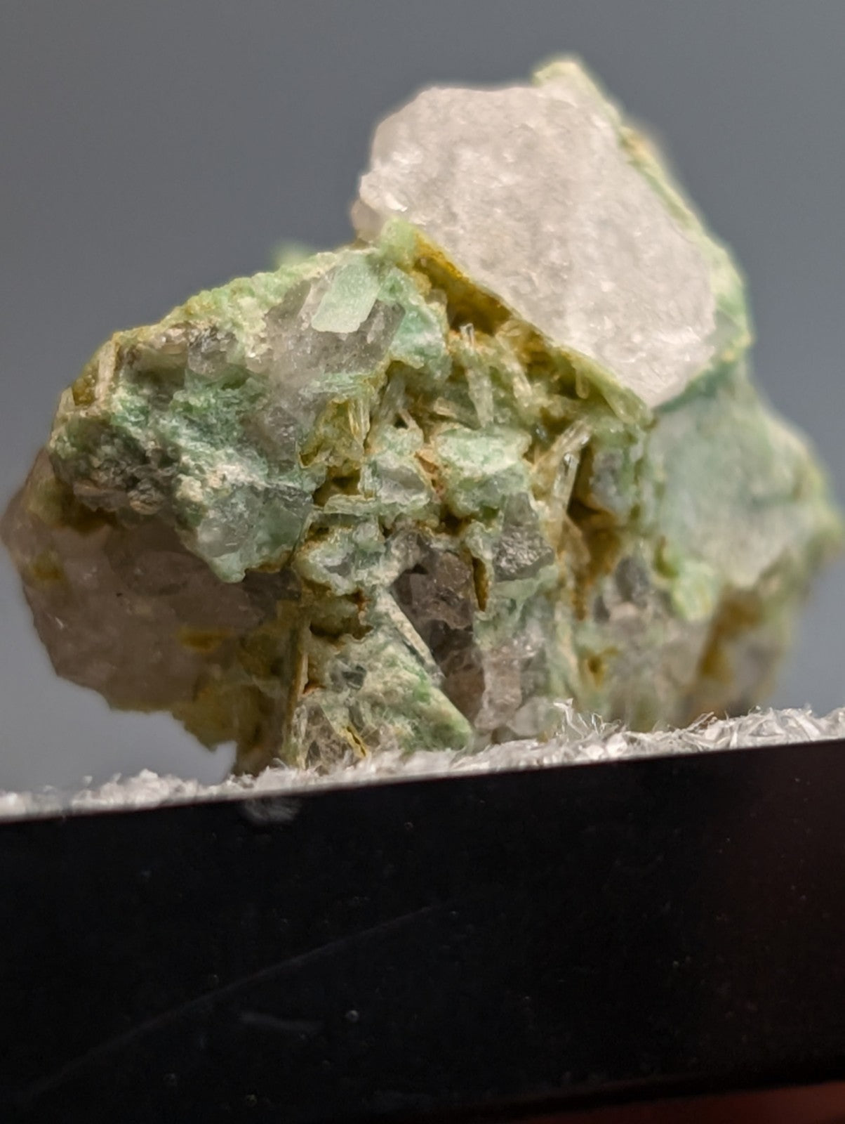 Wavellite on variscite mineral specimen with translucent green crystals and white matrix from Polk County Arkansas