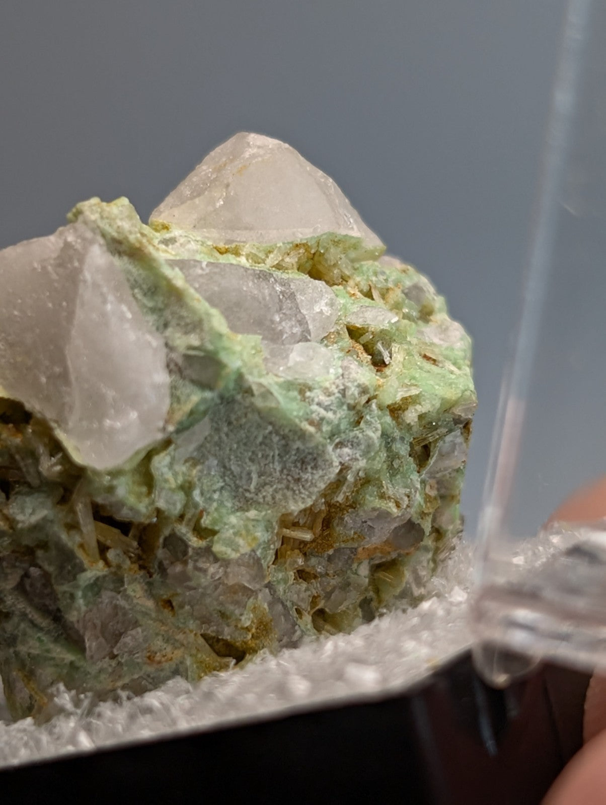 A translucent white wavellite quartz cluster with greenish-yellow variscite inclusions from polk county Arkansas