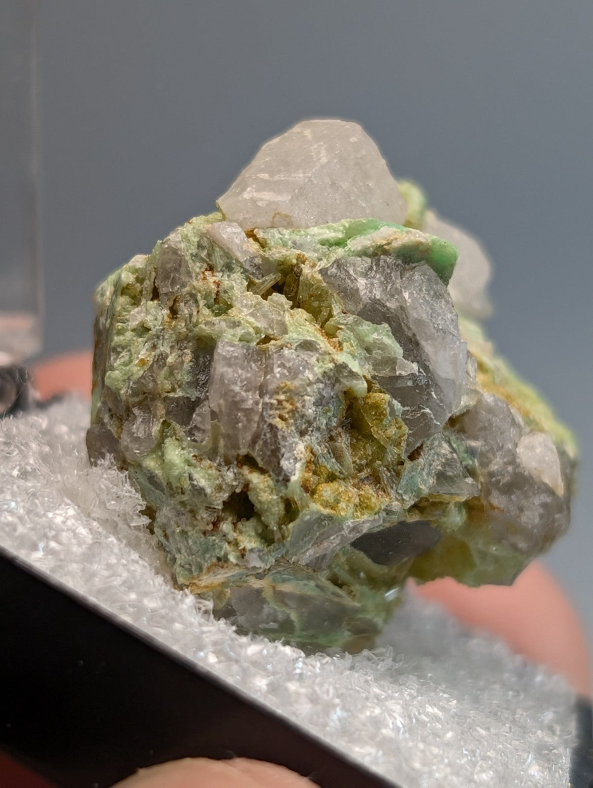 Wavellite on variscite mineral with translucent gray crystals and green yellow hues from Polk County Arkansas